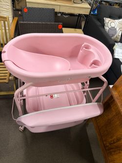 Baby bathtub with changing table,
