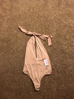 Small light pink bodysuit