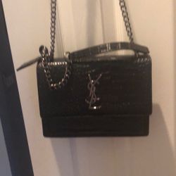 YSL Embossed Leather https://offerup.com/redirect/?o=QmFnLk5ldw==