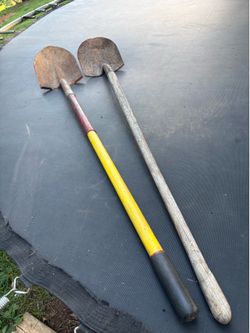 Two round point shovels.