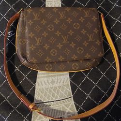 Original Brown Louis Vuitton (*Minor Defect Where Button Clasps) 