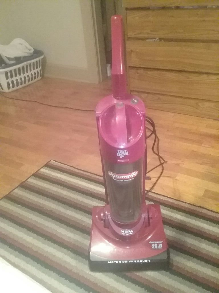 Dirt Devil model 084610 dynamite compact bagless quick vac. 26.0 dyna power HEPA filtration f2 with a motor driven brush