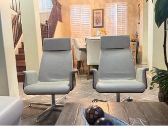 Pair of Mid-Century Modern Style Swivel Lounge Chairs( brand OFS Madrid lounge chairs )