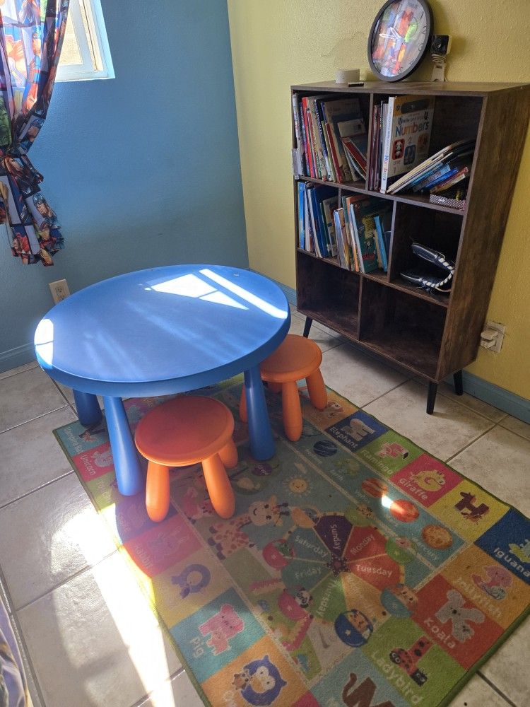 Bookshelves, Table And Chairs