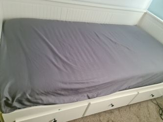 Twin size mattress and bottom rails (not selling the bed frame)