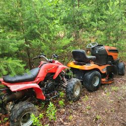   Husqvarna   Riding lawn mower.
 And 4 Wheeler.