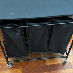 Laundry basket table