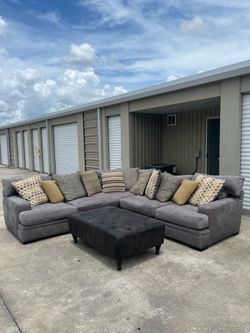 Cindy Crawford gray sectional couch