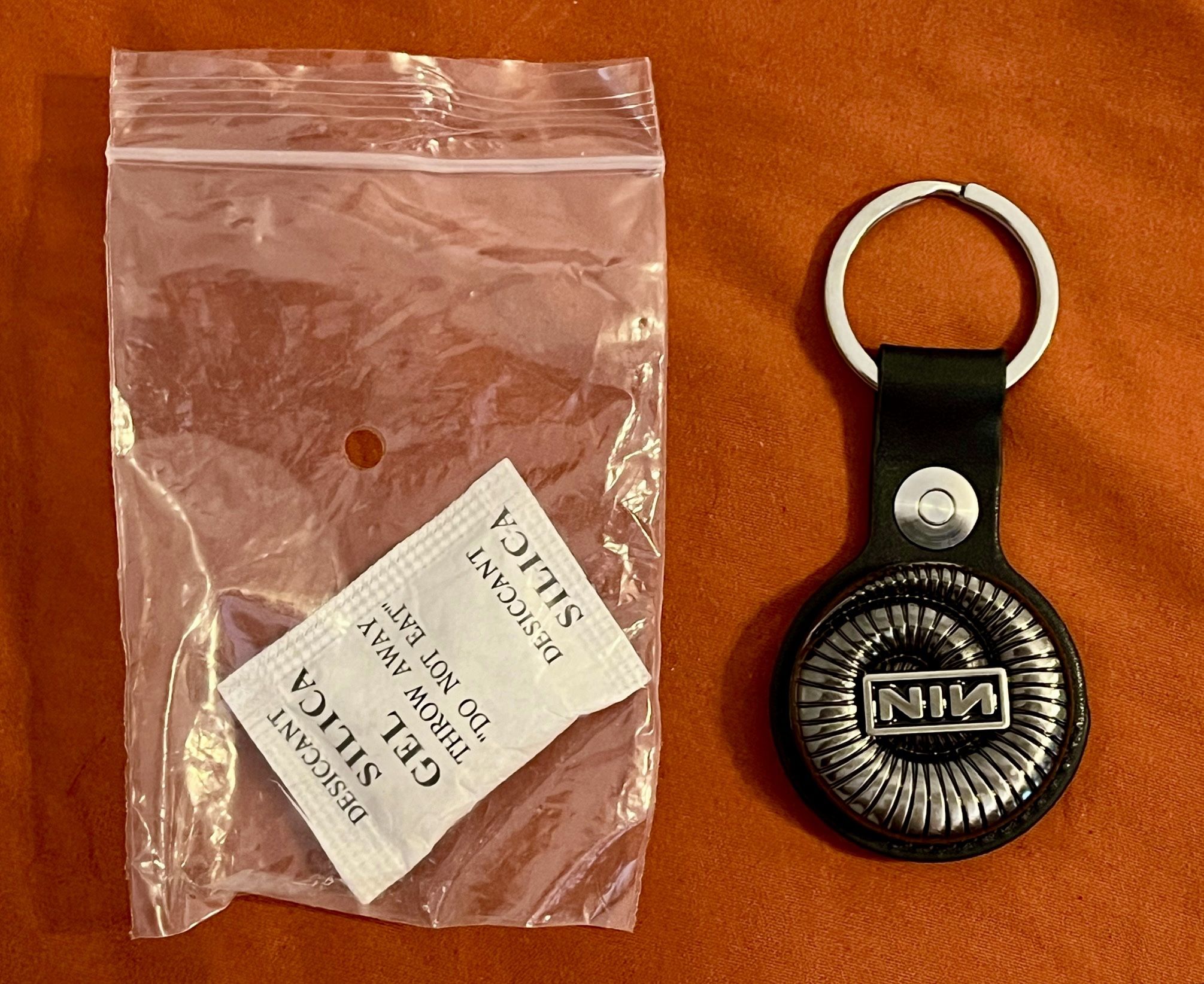 Nine Inch Nails NIN 2025 Peel It Back Tour Collectible Air Tag Key Chain