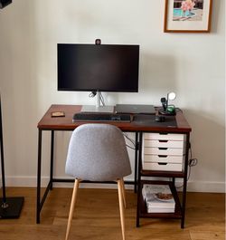 Walnut/mahogany finish desk with black frame
