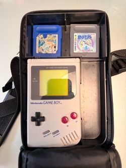 Original DMG Gameboy with Pokémon Blue and Silver (Japan)
