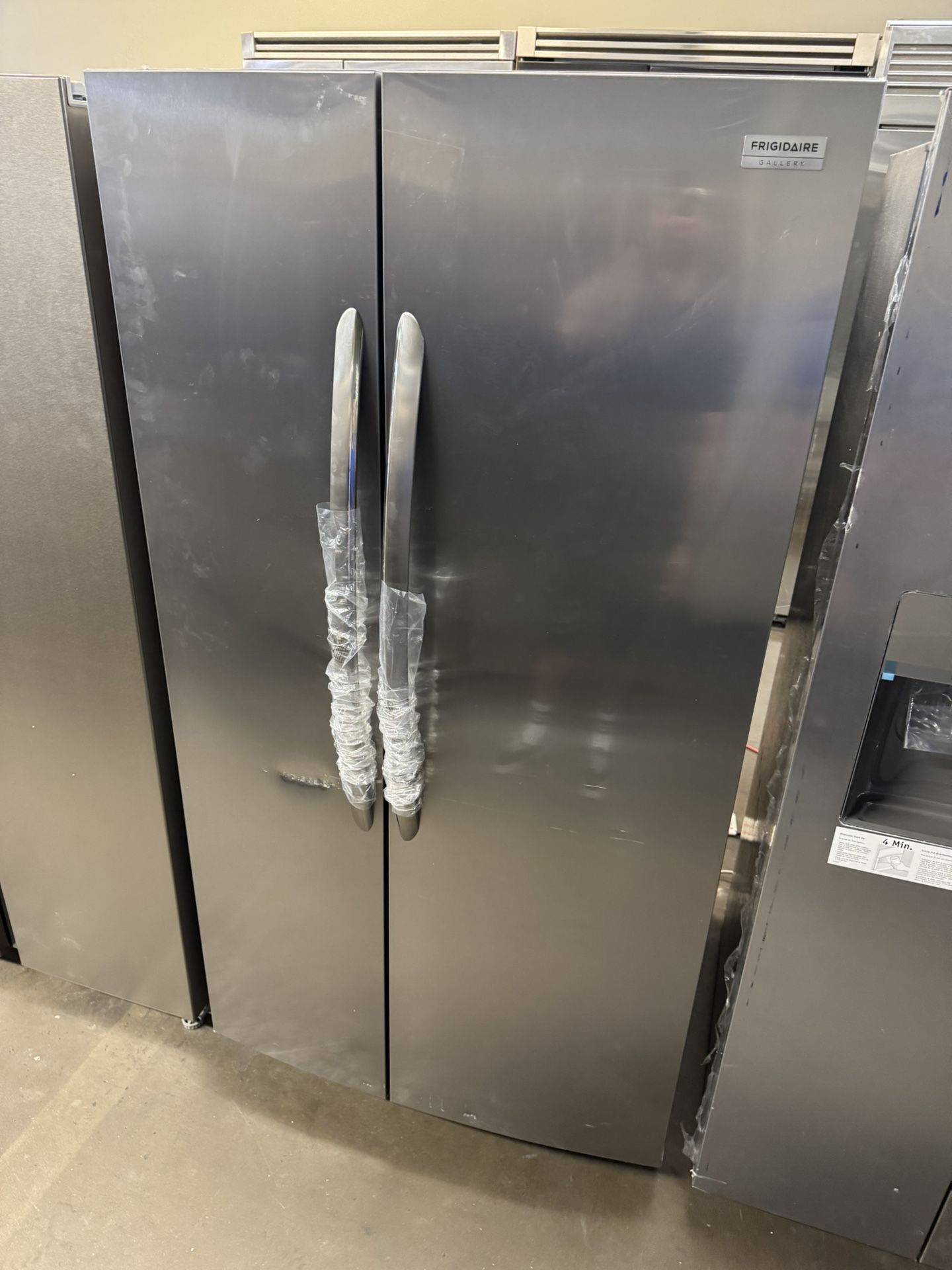 Frigidaire Stainless Steel Side By Side Refrigerator With Ice maker And Internal Water Dispenser