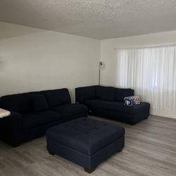 Navy blue L Sofa with ottoman 