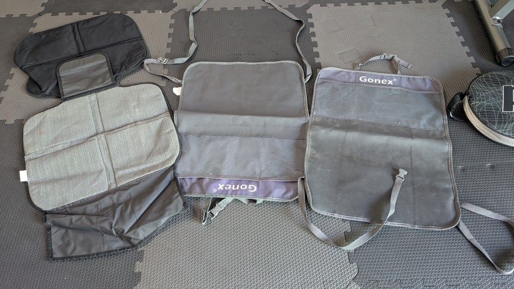 Kids Kickmats And Booster Seat Under Cover