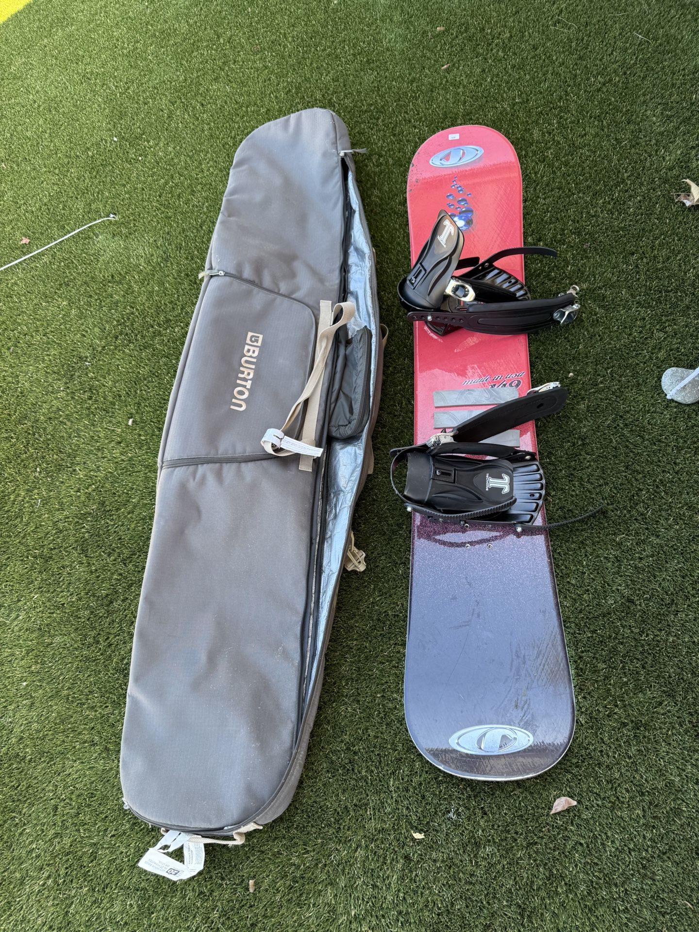 FREE: Jobe 149 cm snowboard  With Burton travel snowboard bag