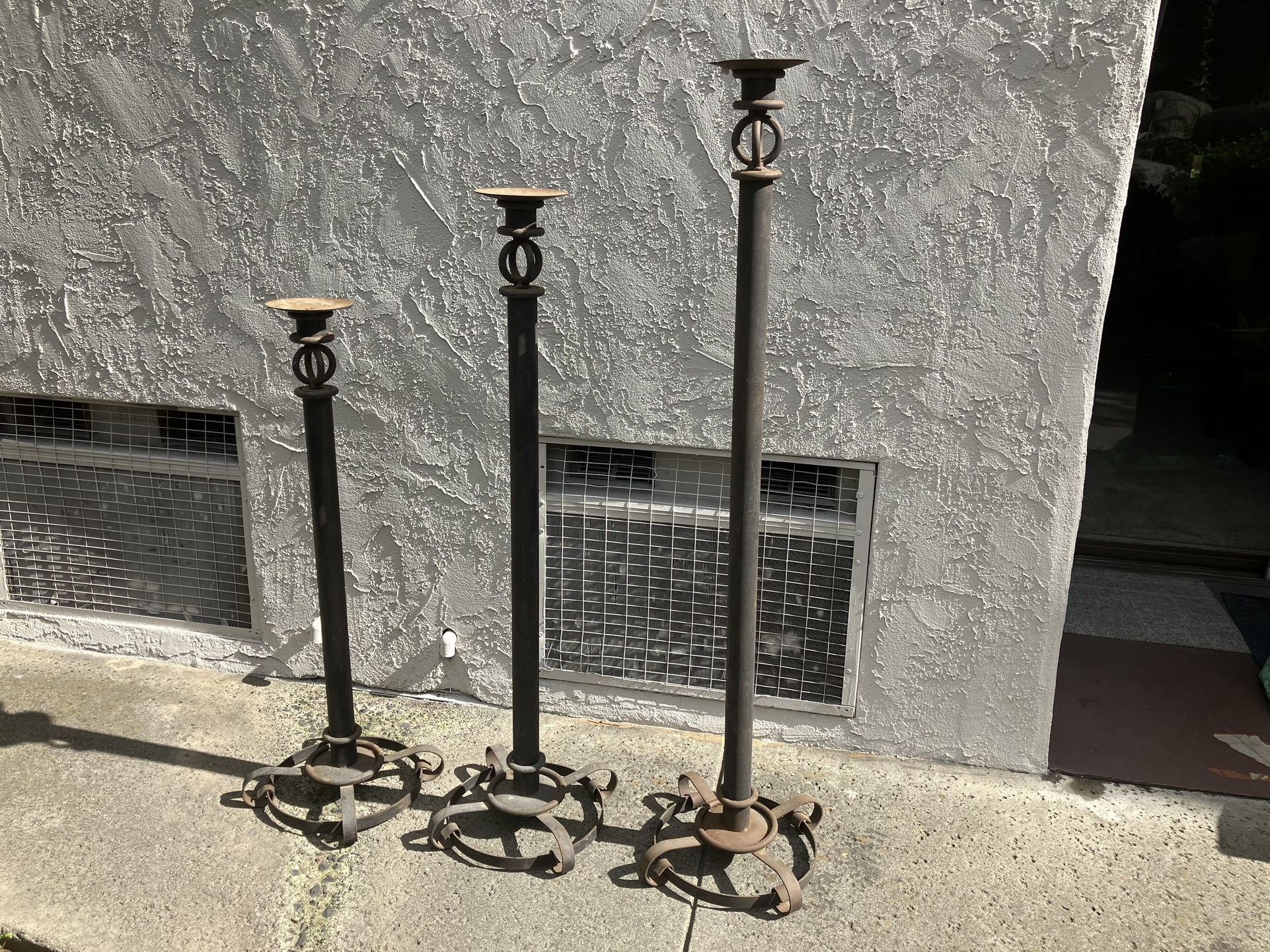 Three Tall Pillar Style Outdoor Candle Holders