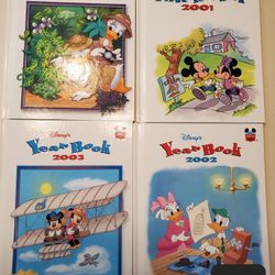 Set Of 4 Disney Year Books 