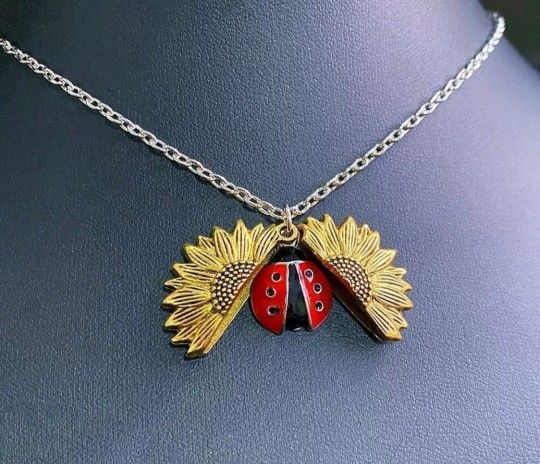 New sunflower ladybug locket necklace. Gold or silver available.  SHIPPING AVAILABLE 