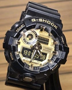 Gold & Black G Shock watch