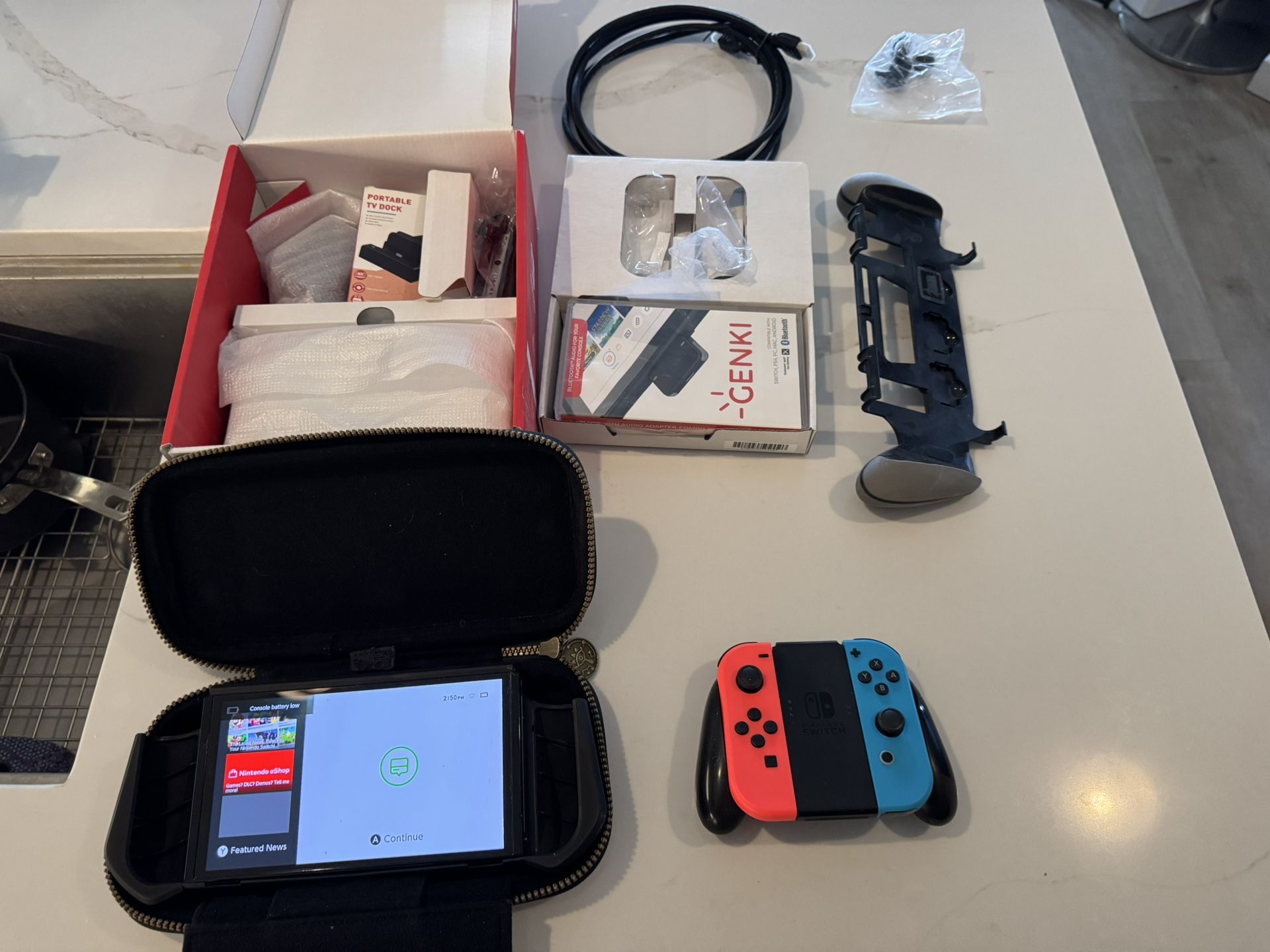 Nintendo Switch OLED (like New) including box,all original accessories, and lots of extras.