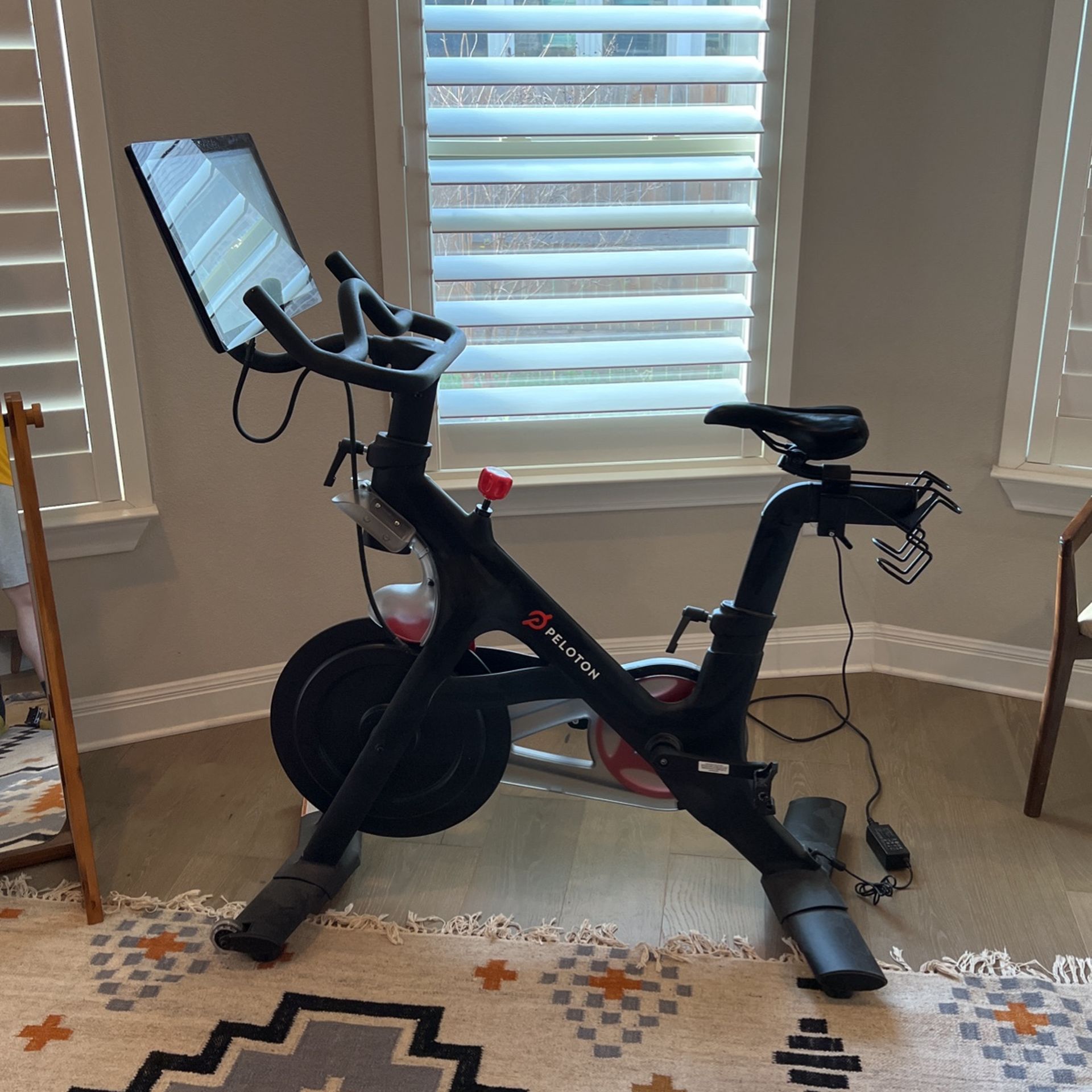 Peloton Bike | Indoor Stationary Exercise Bike with Immersive 22" HD Touchscreen