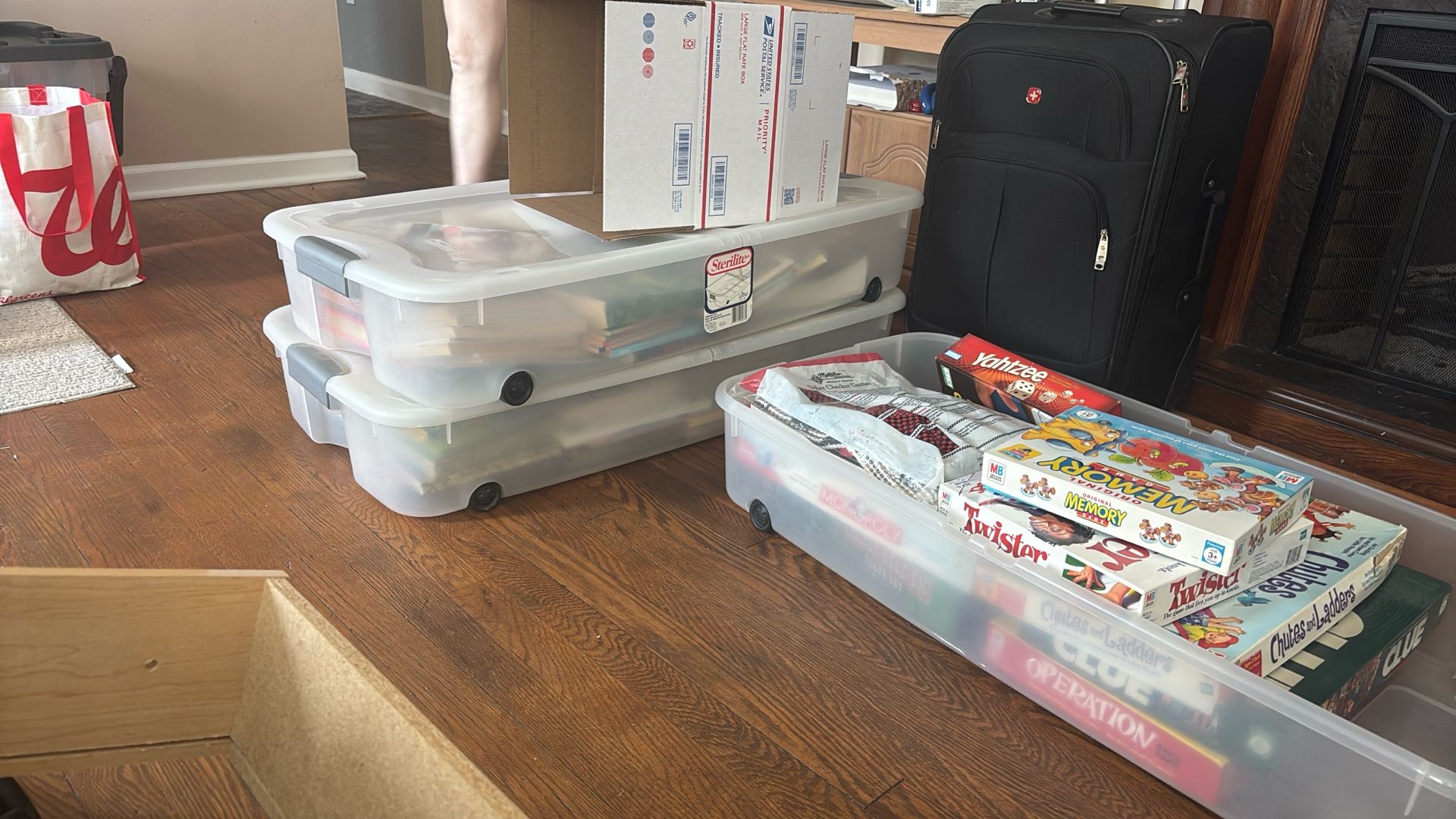 2 containers full of books mostly kid books