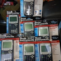 7 Texas Instruments TI-84 Plus Graphing Calculators