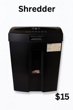 This compact black paper shredder is perfect for home or small-office use. It features a top-loading slot with clear icon labels for safe operation, a
