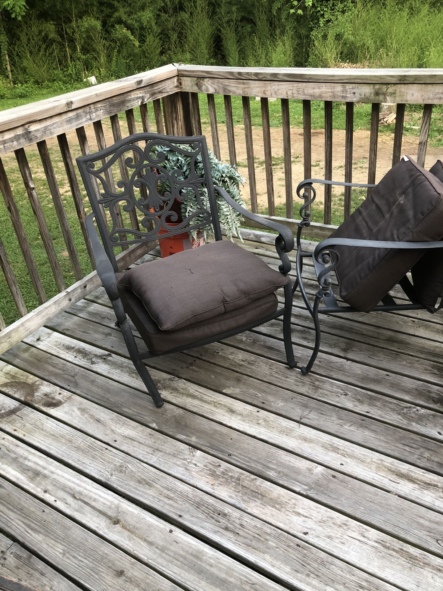 2 wrought iron deck chairs need new cushions $20. a piece. 20 for-birdcage