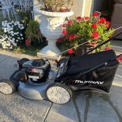 Murray 21 in. 140 cc Briggs and Stratton Walk Behind Gas Push Lawn Mower with Height Adjustment and with Mulch Bag