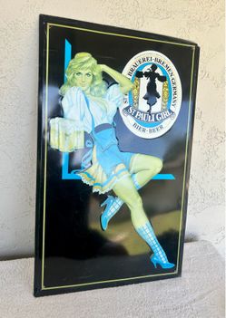 St. Pauli Girl black metal bar sign.