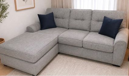 Grey sectional/ sillón gris