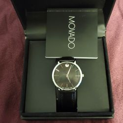 Movado Ultra Slim Black Dial Black Leather Strap Watch For Men+ Box .New Japanese Battery, good working.