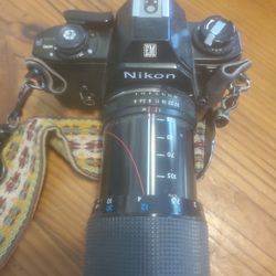 Nikon 35 Mm Camera With Telephoto Lense