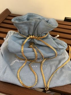 Vintage leather Judith Lieber handbag with gold metal chain with tassels