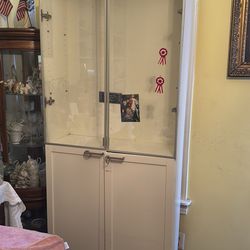 Glass bookshelf with cover free pick up only