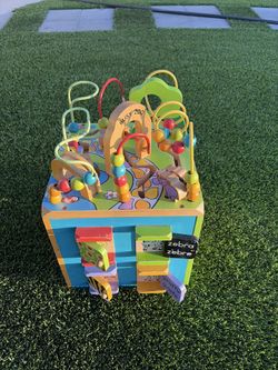B. toys Wooden Activity Cube kids toy