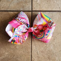 New. New without tags. JoJo Siwa Pink Skittles Bow