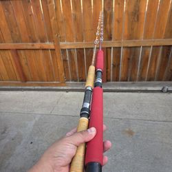 Custom Wrapped Older Ocean Fishing Poles