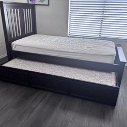 Wood twin trundle bed with mattresses