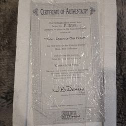 This is an Ardleigh Elliott Princess Diana heart-shaped music box, often from the "Queen of Our Hearts" or similar collection, issued around 1998. 
