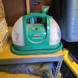 Portable Carpet Cleaner. 