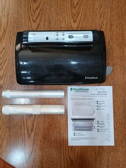 FoodSaver brand food sealer. 2 rolls sealer bags. Excellent condition.