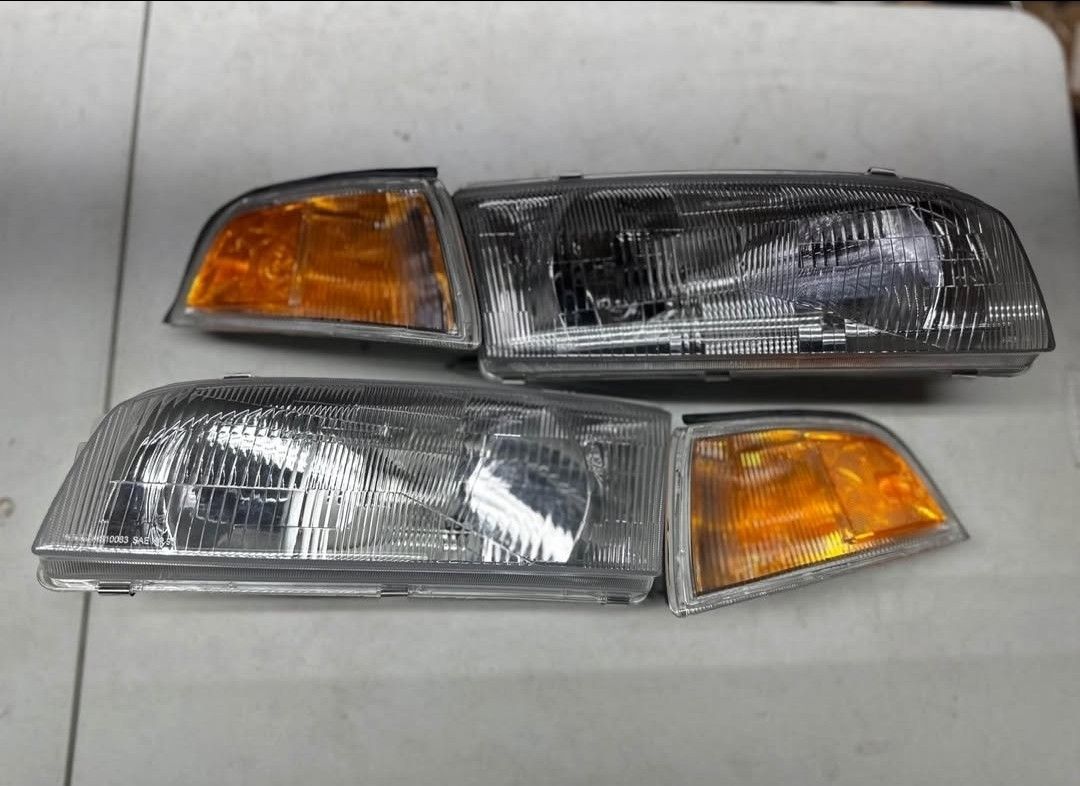 97-02 MITSUBISHI MIRAGE SEDAN HEADLIGHTS FAROS CALAVERAS MICAS LUCES