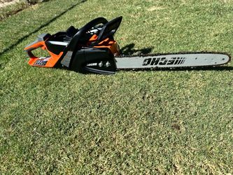 ECHO 56V 18-inch cordless electric chainsaw kit with brushless motor, rear handle, 2.5 Ah battery, and charger.