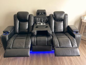 Two Home Theater Couch’s with built in speakers and LED Lights