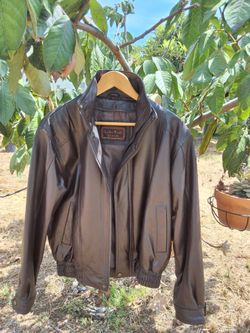 Brown leather jacket. Size small.   Heavy Duty.  Good condition.  Like new