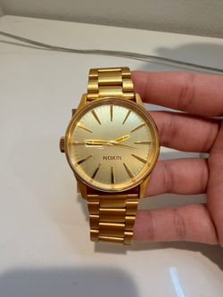 Nixon gold watch