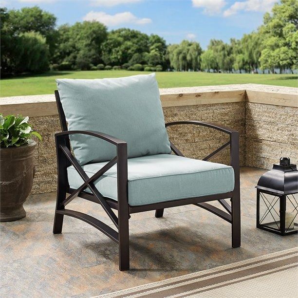 Crosley Furniture Kaplan Arm Chair In Oiled Bronze With Mist Universal Cushion Cover DESCRIPTION: Add simple elegance to your outdoor area with the K