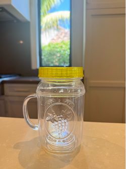 Mason jar cup with straw hole